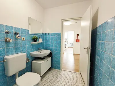 Ein Badezimmer in der Unterkunft ERB01 - 2-Zimmer-Apartment mit Balkon in Bad König