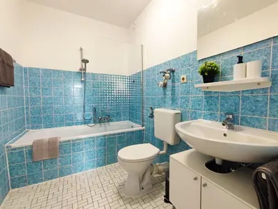 Ein Badezimmer in der Unterkunft ERB01 - 2-Zimmer-Apartment mit Balkon in Bad König