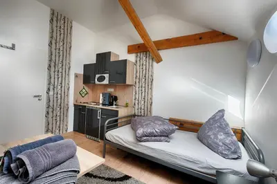 Ein Bett oder Betten in einem Zimmer der Unterkunft Pension Weinsberger Tal