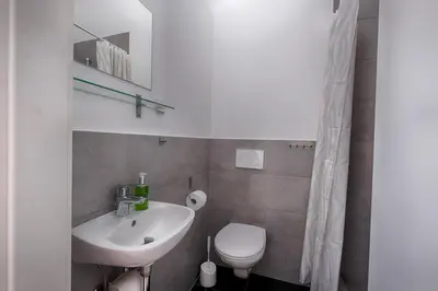 Ein Badezimmer in der Unterkunft Pension Weinsberger Tal