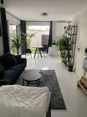 Ein Sitzbereich in der Unterkunft Stilvolle 1-Zimmer Wohnung mit Terasse nahe Therme und Prezero Arena