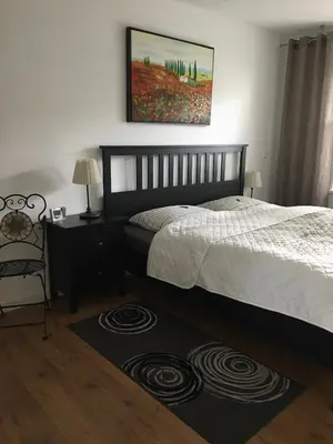 Ein Bett oder Betten in einem Zimmer der Unterkunft Ferienwohnung Familie David