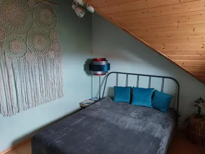 Ein Bett oder Betten in einem Zimmer der Unterkunft Ferienwohnung in Worms