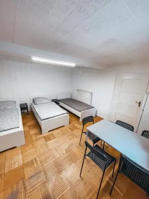 Ein Bett oder Betten in einem Zimmer der Unterkunft Unterkunft SL