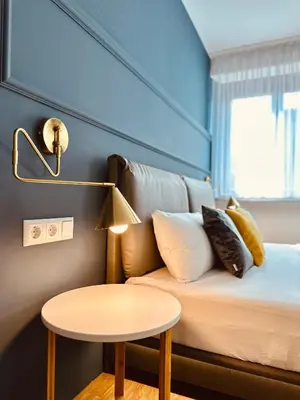 Ein Bett oder Betten in einem Zimmer der Unterkunft Stadthaus Neckarsulm serviced apartments - Stadthaus Schrade