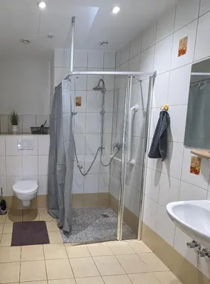 Ein Badezimmer in der Unterkunft Pension am Park
