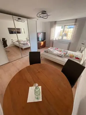 Ein Bett oder Betten in einem Zimmer der Unterkunft Kasa Klemm - helle und zentral gelegene Wohnung