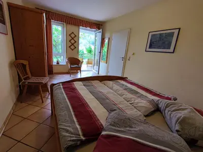 Ein Bett oder Betten in einem Zimmer der Unterkunft Ferienwohnung 