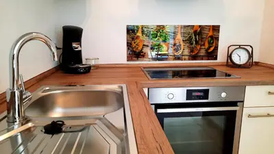 Küche/Küchenzeile in der Unterkunft Ferienappartement am Slevogtweg