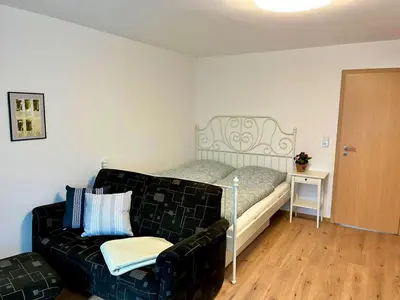 Ein Bett oder Betten in einem Zimmer der Unterkunft Engelhard´s Ferien Apartment