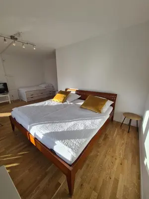 Ein Bett oder Betten in einem Zimmer der Unterkunft Wolke7 und Himmelsleiter2