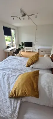 Ein Bett oder Betten in einem Zimmer der Unterkunft Wolke7 und Himmelsleiter2