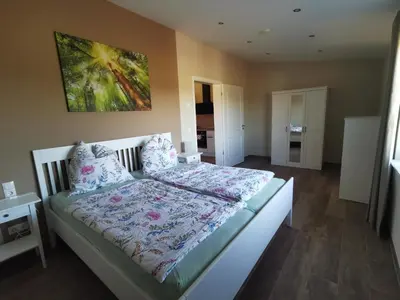 Ein Bett oder Betten in einem Zimmer der Unterkunft Ferienwohnung Gestüt von Erden