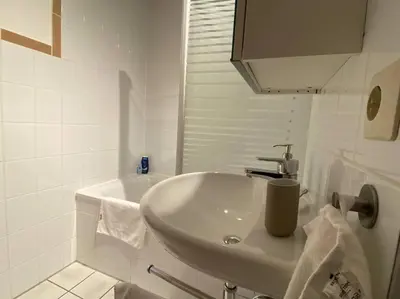 Ein Badezimmer in der Unterkunft Hübsche Wohnung mit Balkon für 1-2 Personen - Einzelbetten