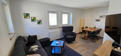 Ein Sitzbereich in der Unterkunft Kiwihof Ferienhaus Südpfalz