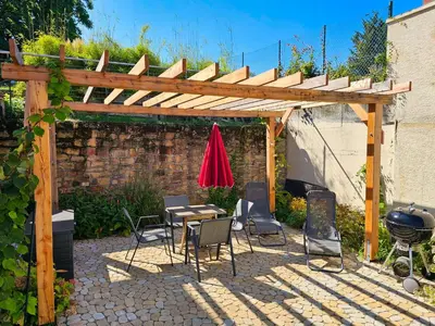 Ein Patio oder anderer Außenbereich in der Unterkunft Kiwihof Ferienhaus Südpfalz