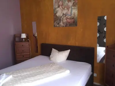 Ein Bett oder Betten in einem Zimmer der Unterkunft Zimmer in Kaiserslautern