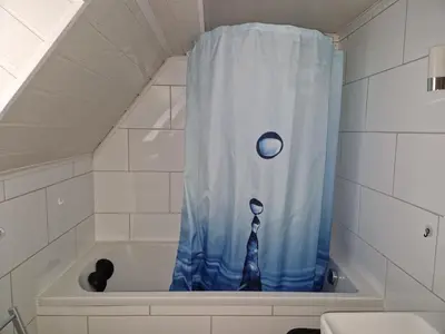Ein Badezimmer in der Unterkunft Ferienwohnung Blumenshein bei Speyer Karlsruhe Familienfreundlich 5 Pers