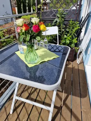 Ein Balkon oder eine Terrasse in der Unterkunft Ferienwohnung Rosenblüte