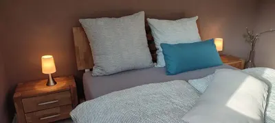 Ein Bett oder Betten in einem Zimmer der Unterkunft Gästezimmer Waldblick Leinsweiler