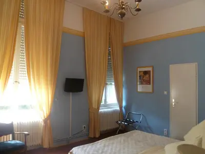 Ein Bett oder Betten in einem Zimmer der Unterkunft Hotel Waldfriede