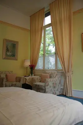 Ein Bett oder Betten in einem Zimmer der Unterkunft Hotel Waldfriede