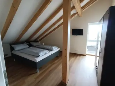 Ein Bett oder Betten in einem Zimmer der Unterkunft Weinrebenblick