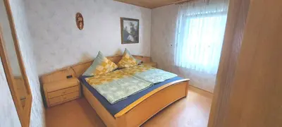 Ein Bett oder Betten in einem Zimmer der Unterkunft Apartment Popp Langen