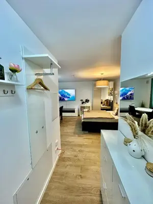 Ein Bett oder Betten in einem Zimmer der Unterkunft Moderne 1-Zi Stadtwohnung