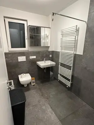 Ein Badezimmer in der Unterkunft Moderne 1-Zi Stadtwohnung