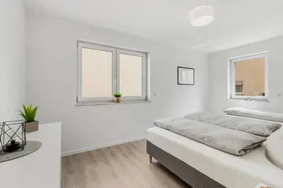 Ein Sitzbereich in der Unterkunft WINETIME - modern - Boxspringbetten - Nähe Mercedes-Benz