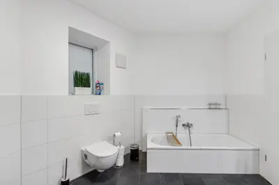 Ein Badezimmer in der Unterkunft WINETIME - modern - Boxspringbetten - Nähe Mercedes-Benz