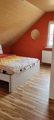 Ein Bett oder Betten in einem Zimmer der Unterkunft Selzen