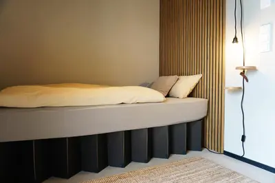 Ein Bett oder Betten in einem Zimmer der Unterkunft Talbach Apartments