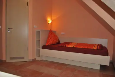 Ein Bett oder Betten in einem Zimmer der Unterkunft Hotel Gasthof “Goldener Engel”