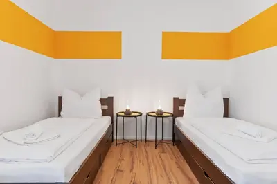 Ein Bett oder Betten in einem Zimmer der Unterkunft Golden Home with Barbecue, Yoga, Football Table
