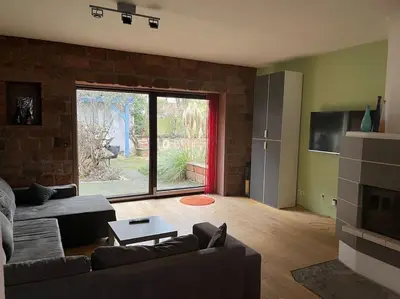 Ein Sitzbereich in der Unterkunft Schöne Wohnung mit Gartennutzung