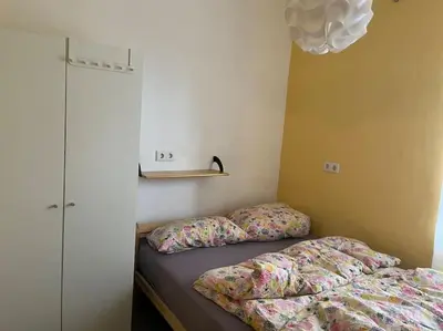 Ein Bett oder Betten in einem Zimmer der Unterkunft Schöne Wohnung mit Gartennutzung