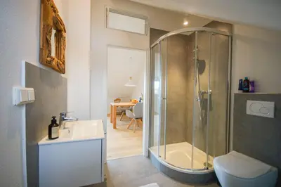 Ein Badezimmer in der Unterkunft Modernes und helles Apartment im Loft Stil