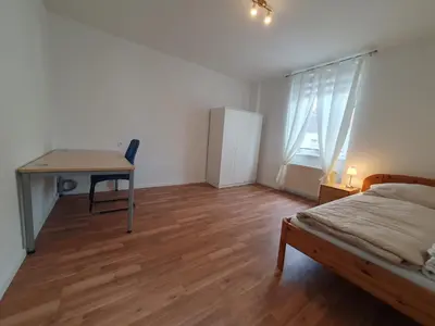 Ein Bett oder Betten in einem Zimmer der Unterkunft Privatzimmer im Schlesischen Viertel - nahe Uniklinik