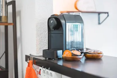 Küche/Küchenzeile in der Unterkunft Roomfall Apartment Sinsheim mit TG & Wi-Fi & Balkon
