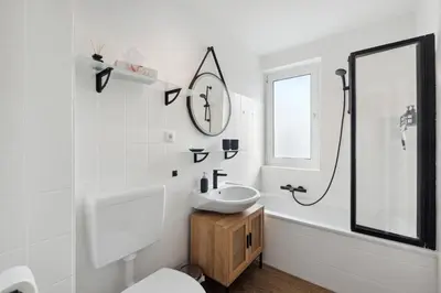 Ein Badezimmer in der Unterkunft Amalfi Apartments A01 - gemütliche 2 Zi-Wohnung mit Boxspringbetten und smart TV