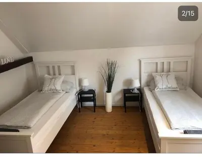 Ein Bett oder Betten in einem Zimmer der Unterkunft Haus Lutherbaum 4 Zimmer