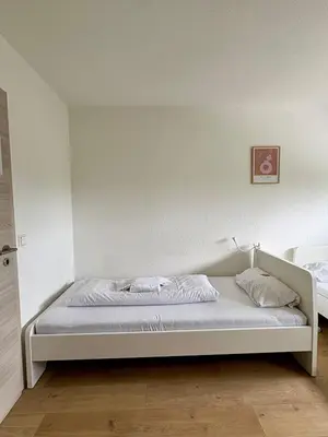 Ein Bett oder Betten in einem Zimmer der Unterkunft kleine und charmante Monteurs Unterkunft D