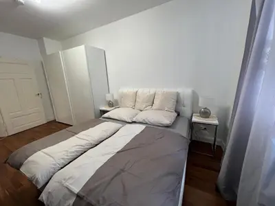 Ein Bett oder Betten in einem Zimmer der Unterkunft Schöne 3 Zimmer Wohnung in Top Lage Heidelberg