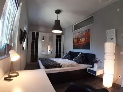 Ein Bett oder Betten in einem Zimmer der Unterkunft Bello Apartamento