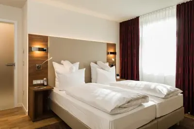 Ein Bett oder Betten in einem Zimmer der Unterkunft Living Apartments Ludwigshafen