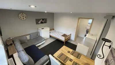 Ein Bett oder Betten in einem Zimmer der Unterkunft Nice Apartment in Mörfelden