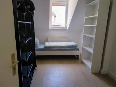 Ein Bett oder Betten in einem Zimmer der Unterkunft Monteurwohnung Worms
