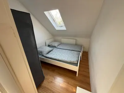 Ein Bett oder Betten in einem Zimmer der Unterkunft Monteurwohnung Heilbronn Zentrum